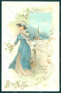 Greetings Fashion Lady Flowers Winter Relief postcard HR0143 – fronte