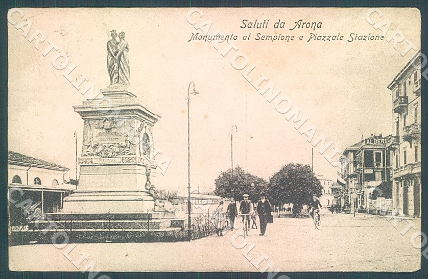 Novara Arona Piazzale Stazione saluti da cartolina JK7897 – fronte
