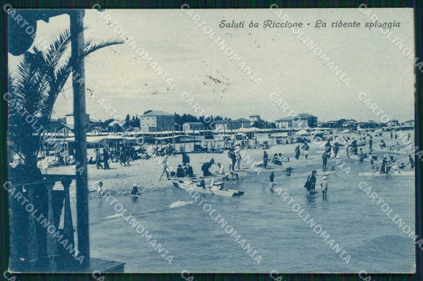 Rimini Riccione Saluti da Ridente Spiaggia cartolina RT0892 – fronte