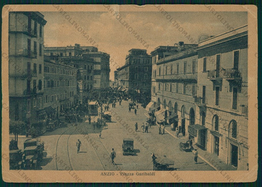 Roma Anzio Piazza Garibaldi Tram Auto STRAPPO PIEGHINE FG cartolina VK2652 – fronte